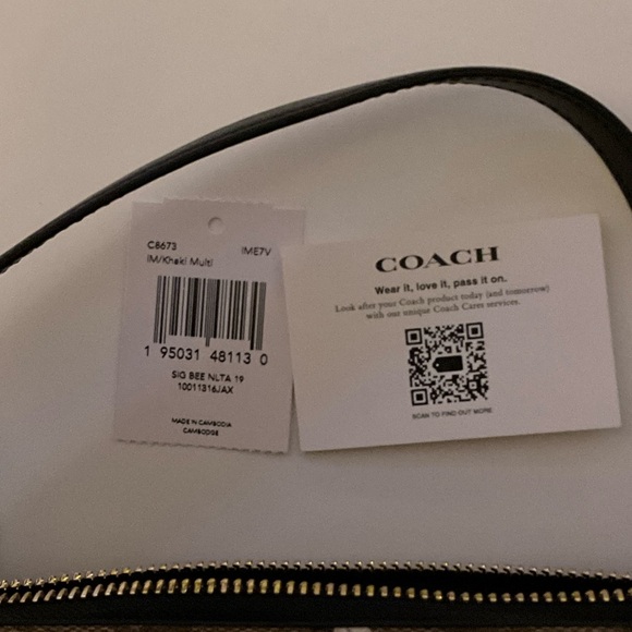 Coach Tan Floral Pattern Wristlet
